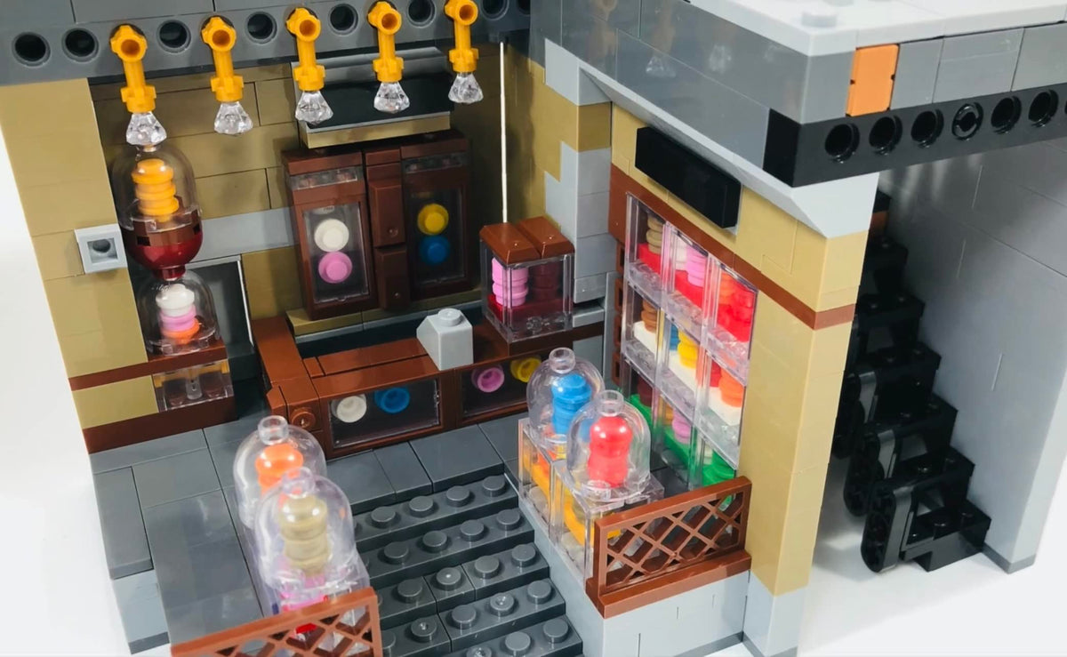 General Jim's Toy Store Square Two-Story Building Blocks Set – Detailed European-Inspired Modular City Model – Includes Accessories, Sidewalk Features, Interactive Areas & More!